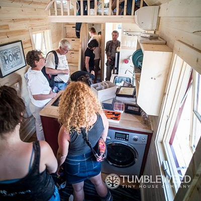 At Tumbleweed's Boulder workshop, participants toured a brand-new home. You can see the automated washer-dryer unit tucked under the kitchen galley. (Tumbleweed Houses)